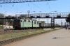 UZ VL80T-1864 arrives into Pomichna with a freight