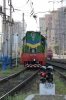 UZ ChME3T-5516 runs into Kyiv Pas with a set of stock while UZ DS3-011 waits outside the station