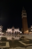 Italy, Venice - Piazza San Marco (St Mark's Square) - Basilica di San Marco (Saint Mark's Basilica) at high tide when sea water gets into the square