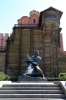 Ukraine, Kiev - Golden Gate (Zoloti Vorota) with a statue of Yeroslav the Wise in front of it. Built in 1037 during Yeroslav's rule this gate was the access point to the ancient city but was destroyed by the Mongols in 1240 and what remains is housed beneath this 1982 construction.