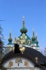 Ukraine, Kiev - St Nicholas Church having a clean in front of St Andrew's Church