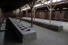 Poland, Auschwitz II - Birkenau - Section BIIa, Men's Quarantine Camp; where new inmates were terrified as they were accustomed to the camp's strict regime. These were their toilet facilities.