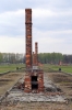 Poland, Auschwitz II - Birkenau - Remains of Section BII taken through the fence that separated Section BIIa from BIIb; most of this section was destroyed by the retreating Nazi's in an attempt to cover up their crimes