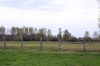 Poland, Auschwitz II - Birkenau - Broken fence that separated Section BII from the never finished Section BIII