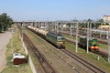 BCh VL80S-581 runs through Zlobin with a freight while ChME3-4090 waits its next work
