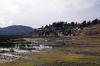 View of Lake Titicaca from Peru Rail's Andean Explorer, train 19 0800 Puno - Cusco, as it heads away from Puno