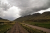 View from the rear of Peru Rail's Andean Explorer, train 19 0800 Puno - Cusco Wanchaq, as it runs downhill from La Raya