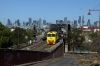 QRN UGR/GE C44aci, 6000 Class, 6024 plus an unidentified loco run light over Bunbury Street Bridge, Footscray, Melbourne