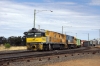 PN GE Cv40-9i NR Classes at Goobang Jct, NR18/13 with a container train having had a crew change
