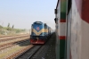 BR BED30 6520 runs through Bangabandhu Setu West with 13110 0745 Dhaka Cantt - Kolkata Chitpur Maitree Express