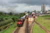 CamRail GM GT26CU-3 CC3301 sits at Yaounde with a container train while Grindrod Pembani Remgro (GPR Leasing Africa) GM GL30SCC-3 GPR30-07 arrives with IC151 0600 Douala - Yaounde Intercity