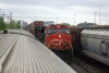 CN train just outside of Winnipeg Union station headed by GE C44-9W #2220 & an unidentified machine