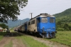 CRF Sulzer 60-1400 is detached from 60-1356 at Valea Viseului, having arrived with R4135 0730 Beclean pe Sommes - Sighetu Marmatiei, 60-1356 will work forward on its own after 60-1400 has split the rear two coaches off and shunted them clear