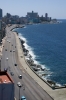 View down Malecon, from the 12th floor of the Hotel Deauville, as the Straits of Florida lap up against the sea wall on the north of Havana