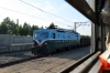 North Korea - KSR Red Flag Class electric #4062 standing at Pupyong with a freight; as seen through the window of our compartment on board KSR train #7 0750 Pyongyang - Tumangang