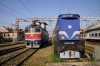 HZ 2044027 stands spare at Zagreb Glavni Kolodvor after arrival with 991 0525 Varazdin - Zagreb GK while HZ 1141380 runs through the station