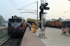 BIA WAG5 23351 waits departure from Jharsuguda Jn with 58117 0715 Jharsuguda Jn - Gondia while BNDM WDS6 36054 sits after shunting the stock in to form 58162 0730 Jharsuguda Jn - Hatia passenger; it had also shunted the stock in for 58117