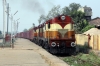 VSKP WDG3A's 14879/13210 power through Sambalpur Road with a freight