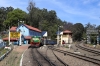 GOC YDM4 6724 waits to depart Coonoor with 56136 0710 Mettupalayam - Udagamandalam (Ooty); having replaced ONR X Class steam loco 37399. GOC YDM4 6664 arrives in the meantime with 56139 0915 Udagamandalam (Ooty) - Coonoor