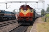 VSKP WDM3D 11536 waits at Therubali with 58528 0300 Visakhapatnam - Raipur Jn while BNDM WDG4's 70126/12945 arrive with a freight