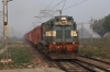 CLA WDG3A 14679 runs through Shahjahanpur Jn with a freight