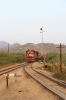 FL YDM4 6739 waits at Phulad's home signal, on the Mavli Jn branch, with 09601 1230 Mavli Jn - Marwar Jn, waiting for the pointsman to set the road into the station