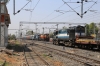 KTE WDM3A 16777 waits the road at Jabalpur Jn with an electrification train while VSKP WDG3A's 14526/14589 arrive with a freight