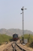FL YDM4 6732 waits at Phulad's home signal, on the Mavli Jn branch, with 52076 0700 Mavli Jn - Marwar Jn, waiting for the pointsman to set the road into the station