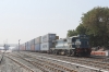 VTA WDG3A 14876 waits at Marwar Jn with a northbound double-stack container train