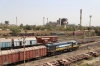 Restricted VTA WDM3A 018728 shunts the yard between Sabarmati Town & Sabarmati Jn where SBI YDM4's 6666 & 6557 are parked up on BG flat wagons