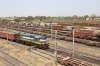 Restricted VTA WDM3A 018728 shunts the yard between Sabarmati Town & Sabarmati Jn while BGKT WDP4D 40255 departs Sabarmati Jn station with an 8 hours late running 19270 1515 (PP) Muzaffarpur - Porbandar