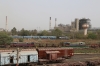 ABR WDM3A 14117 departs Sabarmati Jn with 19412 0625 Ajmer Jn - Ahmedabad Jn. Stabled in the yard adjacent to Sabarmati Town are SBI YDM4's 6666 & 6557 on BG flat wagons