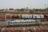 CNB WAG7 27669 in the yard adjacent to Sabarmati Town, where SBI YDM4's 6666 & 6557 are parked up on BG flat wagons