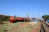 GTL WDG3A's 13390/14898 at Ratnagiri with a southbound freight; note the first electrification masts are in the ground!