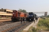 JMP WDM3A 18820 runs through Ratanpur with 12367 1115 Bhagalpur Jn - Anand Vihar Terminus; which overtakes HWH WDM3D 11571 waiting with 13409 0540 Malda Town - Jamalpur Jn Intercity