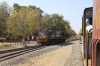 JLR outbased SBI YDM4 6371 waits to run round its train at Talala having arrived with 52952 0715 Junagadh Jn - Delvada, meanwhile classmate 6301 departs with 52950 0805 Delvada - Veraval Jn