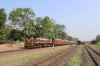 VRL outbased SBI YDM4 6560 waits departure from Talala Jn with 52950 0745 Delvada - Veraval Jn while 6563 waits to run-round having just arrived with 52952 0715 Junagadh Jn - Delvada