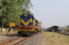 VRL outbased SBI YDM4 6560 waits departure from Talala Jn with 52950 0745 Delvada - Veraval Jn while 6563 waits to run-round having just arrived with 52952 0715 Junagadh Jn - Delvada