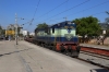 KJM WDG3A 13331 runs through Kengeri, on the Bangalore - Mysore line, with a short engineer's train