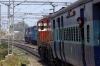 KTE WDG3A 14952 at Kashi with 13009 2035 (06/03) Howrah - Dehradun; IZN WDM3D 11300 shunts coal wagons for unloading ahead