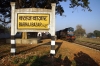 GD WDM2 16887 waits departure from Barhaj Bazar with 55106 0650 Barhaj Bazar - Salempur Jct passenger