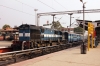 KJM WDM3D 11525 at Bangalore City with 56581 1530 Bangalore City - Yesvantpur stock transfer move; this is the stock ex 56580 Nelamangala - Bangalore City that is then transferred back to Yesvantpur to form 56242 Yesvantpur - Salem (with people on it)