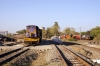 SBI YDM4 6355 waits departure from the make-shift platform at Udaipur City with 19943 1745 Udaipur City - Ahmedabad Jct; SBI YDM4 6254 sits in the sidings with the breakdown train