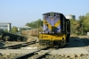 SBI YDM4 6355 waits departure from the make-shift platform at Udaipur City with 19943 1745 Udaipur City - Ahmedabad Jct