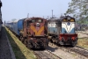 NGC WDS6 36080 and WDM3A 18944 in a carriage siding just east of Guwahati Jct