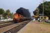 A very unclean HWH WDM3A 18805 accellerates through Belakoba with 15690 1830 (23/03) Dibrugarh - Howrah "Kamrup Express"