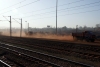More dust is thrown into the air by the constant movement of vehicles at Barbil Railway Station, Orissa, India