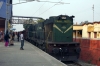 UDL WDG3A 13605 at Ahmadpur Jct with a freight; the gauge conversion office for the old Narrow Gauge can be seen to the right