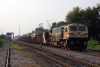 WDG4 12303 passes through Mankapur Jct with an eastbound freight