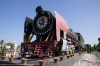 Steam loco #3382 positioned outside New Cooch Behar station in its own gardens